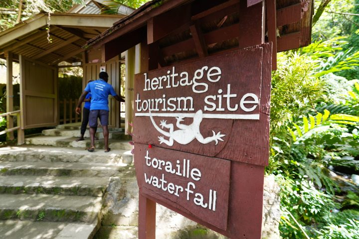 a sign in front of a building