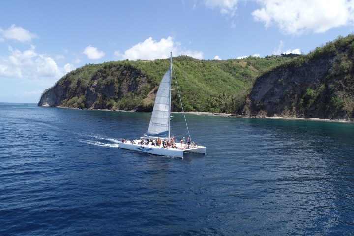 a small boat in a large body of water