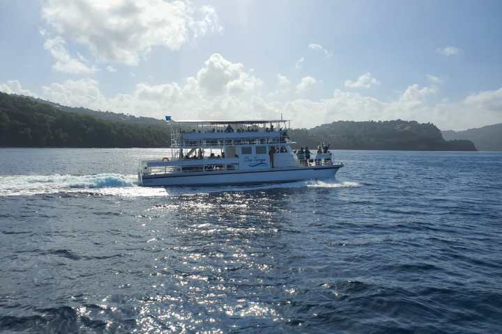 a small boat in a large body of water