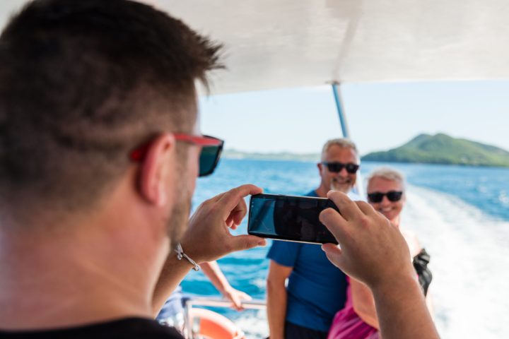 a man drinking from a wine glass