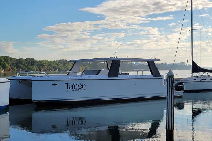 a boat is docked next to a body of water